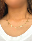Baseball Necklace product picture. The baseball necklace mockup picture worn by a woman 2