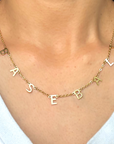 Baseball Necklace product picture. The baseball necklace mockup picture worn by a woman 1