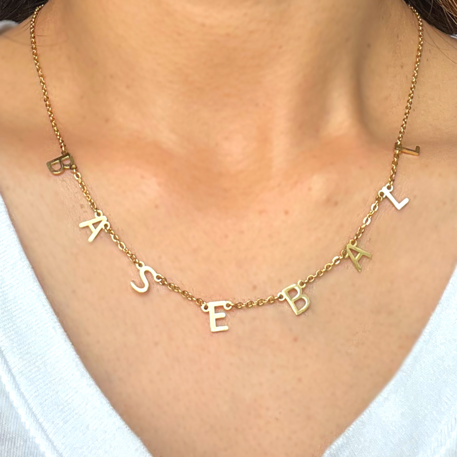Baseball Necklace product picture. The baseball necklace mockup picture worn by a woman 1