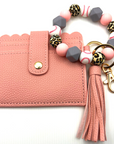 Baseball themed wristlet with wallet and keychain in pink