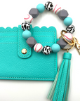 Baseball themed wristlet with wallet and keychain in teal