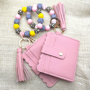 Baseball and softball themed wristlet with wallet and keychain in pink