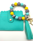 Softball themed wristlet with wallet and keychain in teal