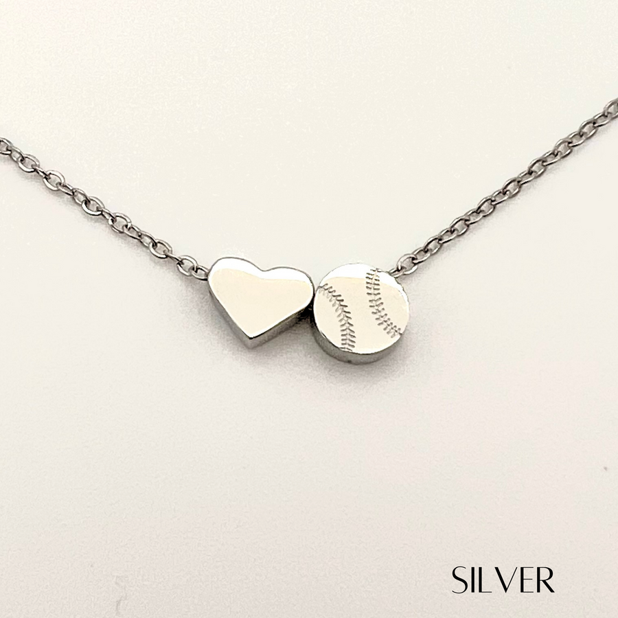 Product close up picture for the Heart and Baseball charm necklace in silver